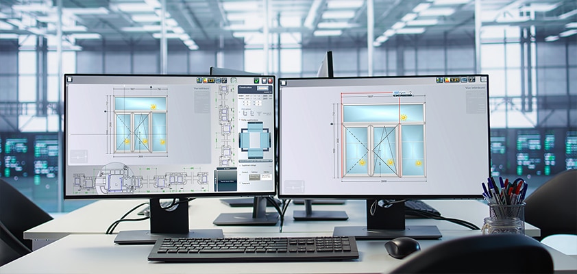 Poste de travail avec deux écrans d'ordinateur avec un système de paramétrage de fenêtre