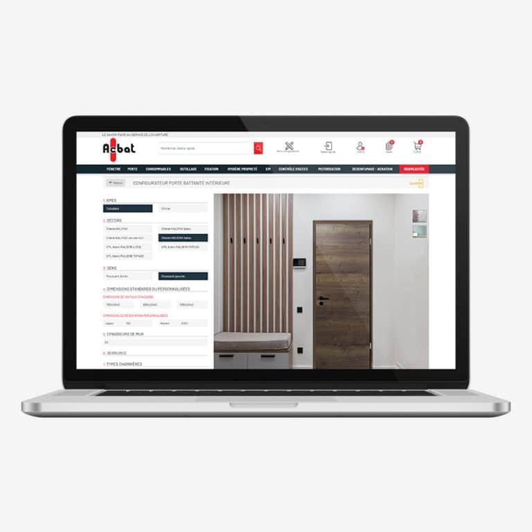 Ordinateur ouvert sur le site de www.acbat.fr